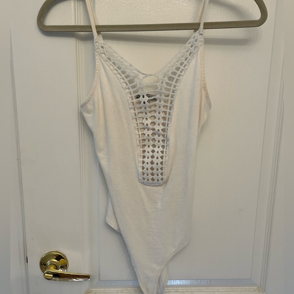 White open front. Worn a few times. Size small from Charlotte Russe.
